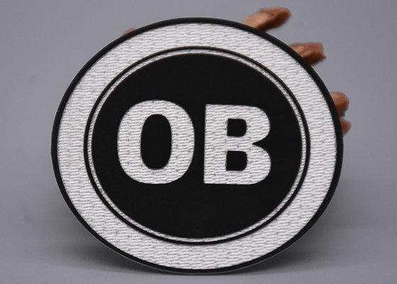 Il tessuto bianco di Tatami ha stampato le etichette con il silicone nero Logo For Garments