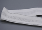 L'abbigliamento ha personalizzato il nastro elastico del jacquard bianco di 35mm con il logo d'argento brillante